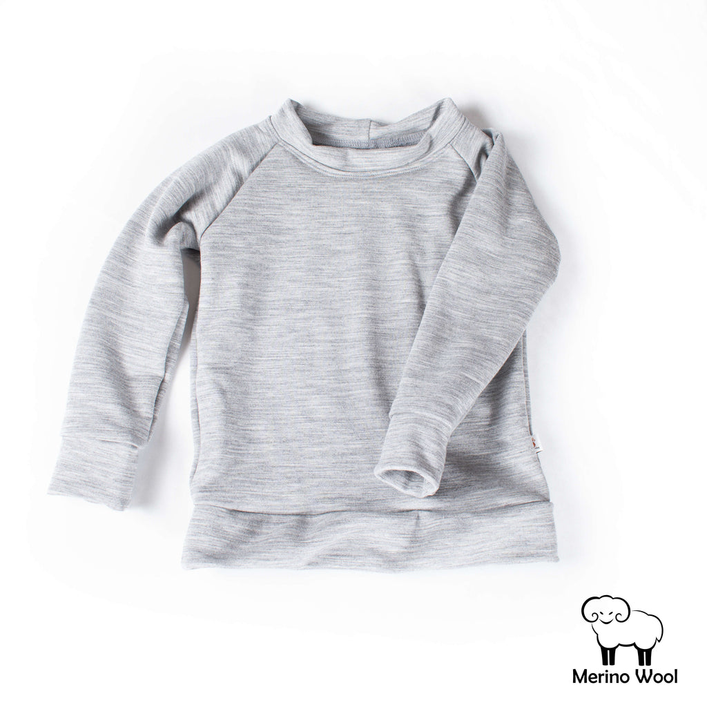 Try our Merino Wool Crew Neck Sweater paired with our signature